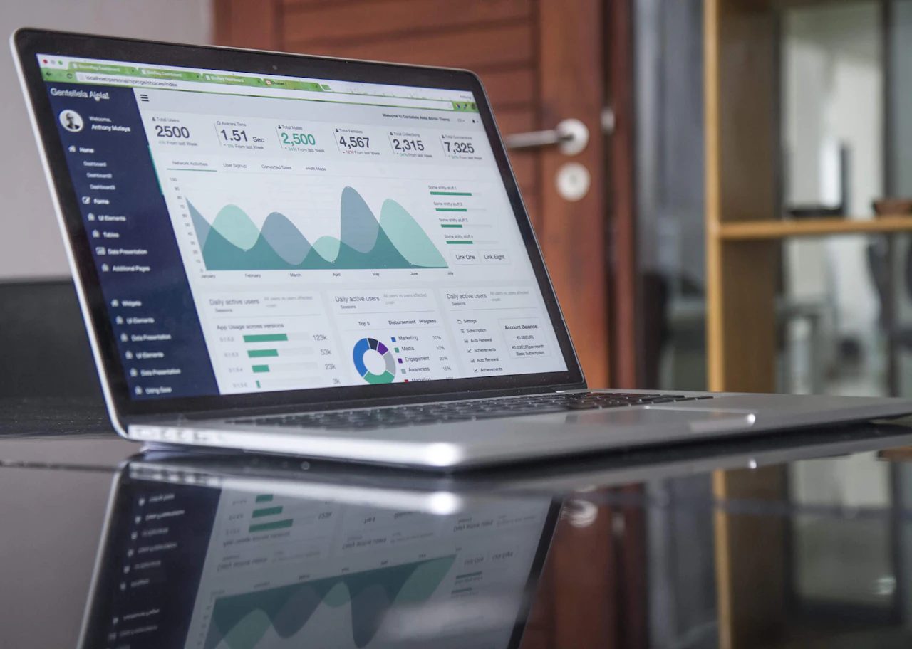 Retailer reviewing commerce performance data on screen